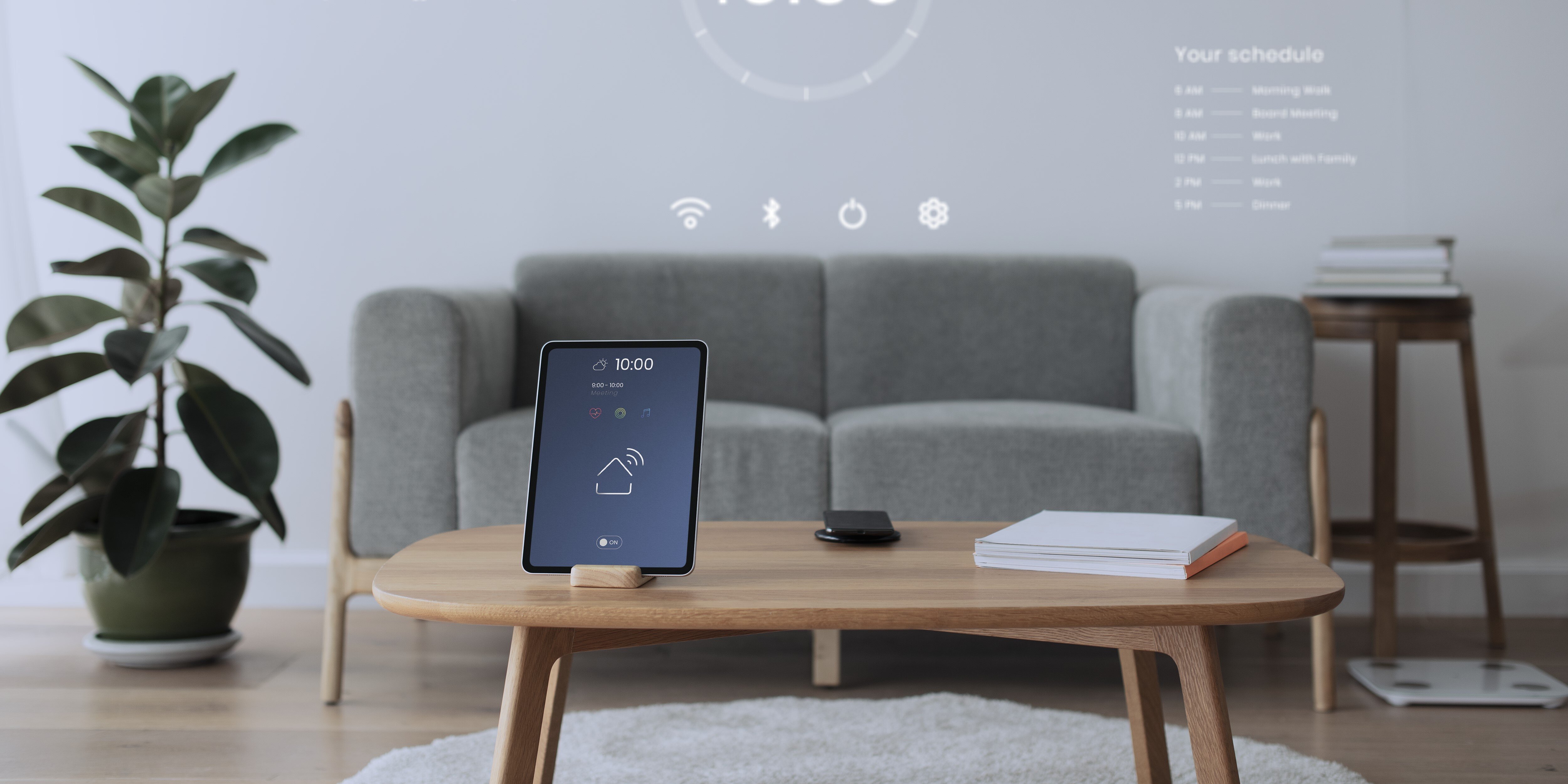 ipad screen on a coffee table connected to a smart home 